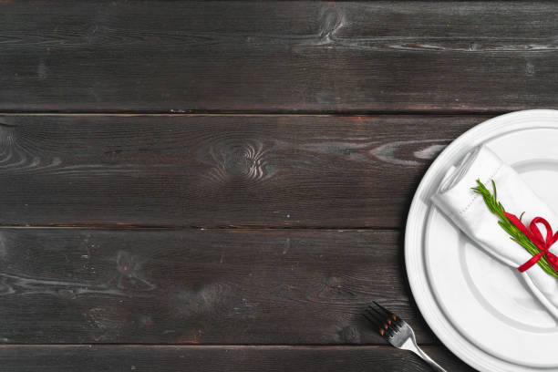 istock Elegant table setting with festive decor on wooden background 1345238376