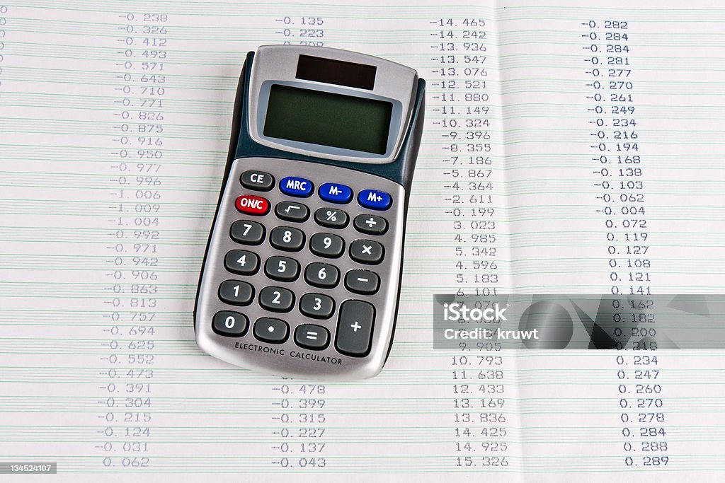 Calculator with a hard copy of tabular digits Black Color Stock Photo