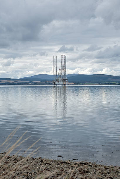 Oil rig at Cromarty Firth Scotland stock photo