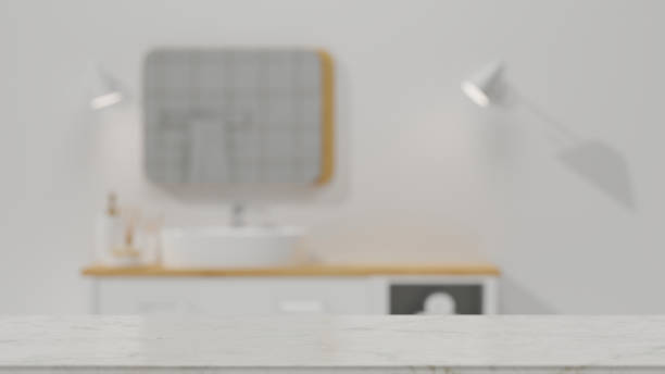 istock White marble tabletop with empty space for montage over blurred clean minimalist bathroom interior 1345246136