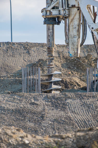 istock Construction Site - Heavy industrial drilling machine at road works 1345253967