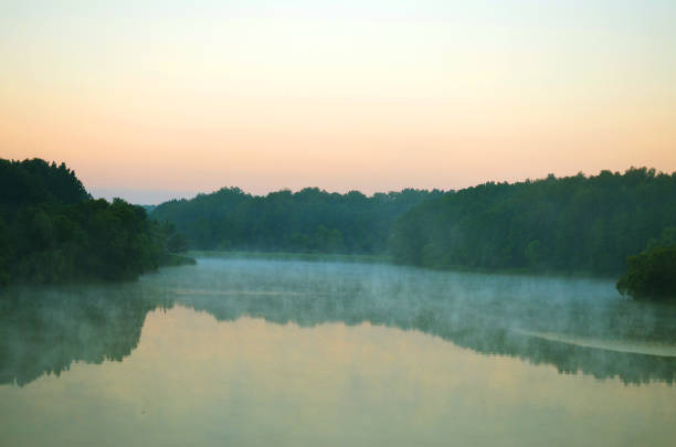 istock Misty haze on the river in the morning 1345255766