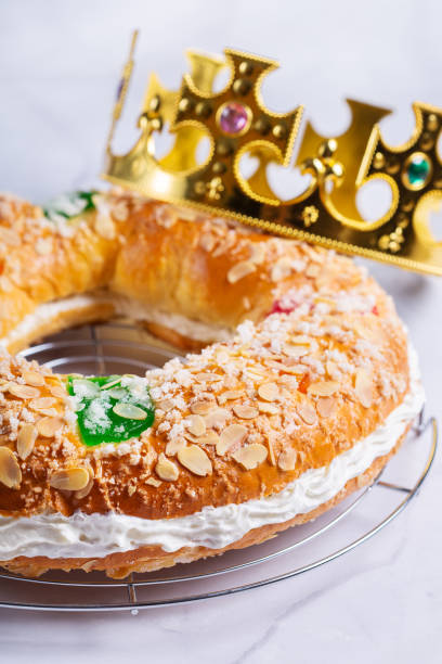istock Traditional Spanish Epiphany cake, Roscon de Reyes with festive decorations 1345256057