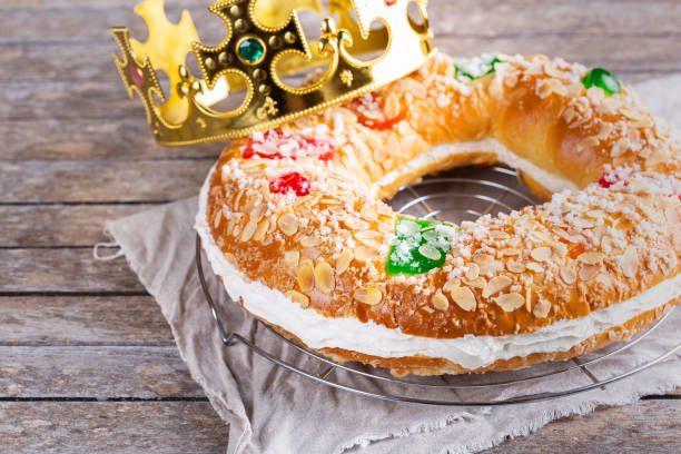 istock Traditional Spanish Epiphany cake, Roscon de Reyes with festive decorations 1345256128