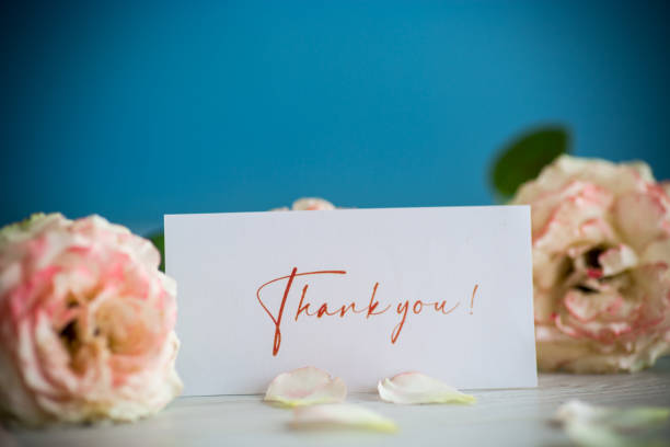 istock bouquet of beautiful orange roses on table 1345259602