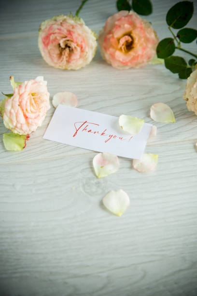 istock bouquet of beautiful orange roses on table 1345259609