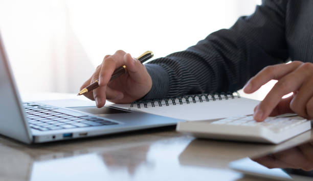 istock strategy analysis concept, Businessman working financial Manager Researching Process accounting calculate analyse market graph data stock information review on the table in office. 1345261946