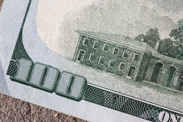 istock Texture of dollar bills. One hundred dollars. Close-up, macro 1345264350