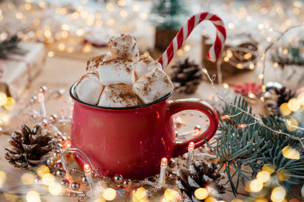 istock Christmas marshmallow hot cocoa cup with candy cane 1345266170
