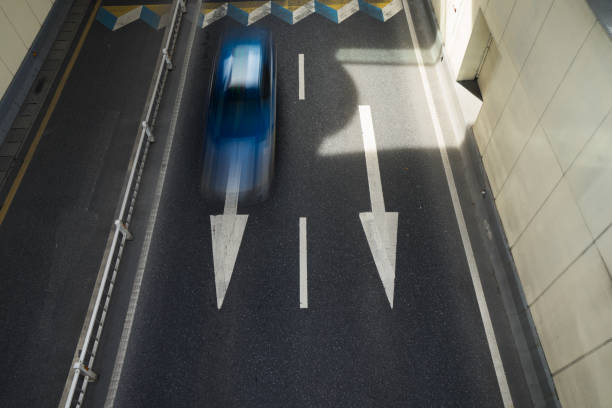 istock cars in highway with blur motion 1345266336
