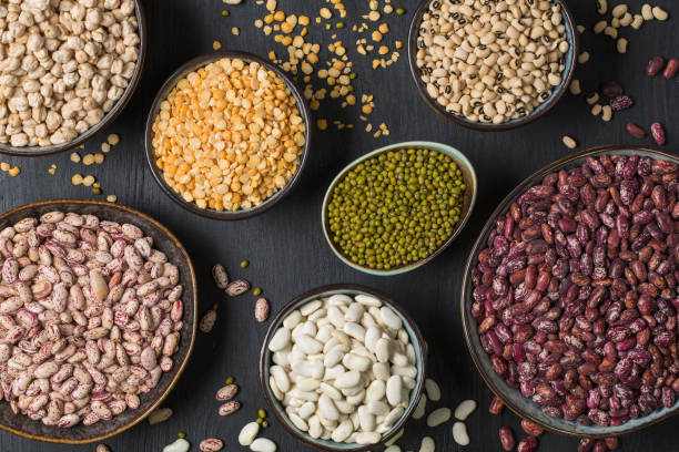 istock Many different types of haricot beans in studio on black 1345267408