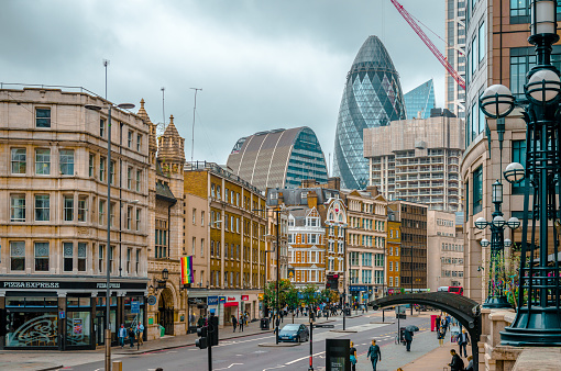 London, UK - September 20 2018: View of Bishopsgate street with the Gherkin, the Can of Ham and the Scalpel towers in the background. Moody sky.