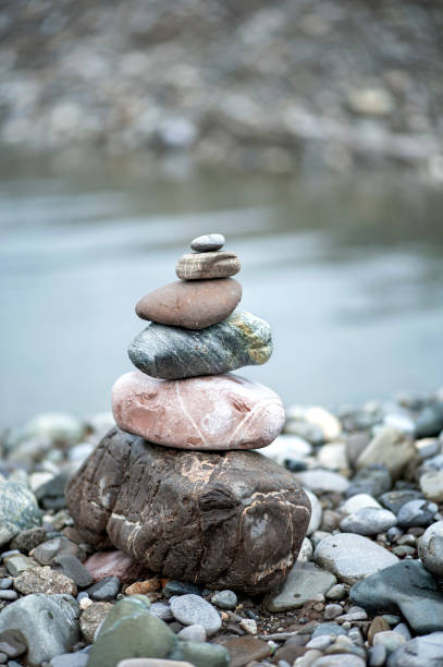 istock Pyramid of stones, balanced zen stones. Pebble pyramid. 1345269416