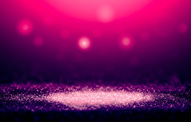 istock Purple and Pink sparkle rays glitter lights with bokeh elegant show on stage abstract background. Vintage background. 1345269731