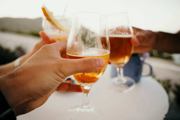 istock Caucasian friends drinking cocktails while on vacation 1345270429