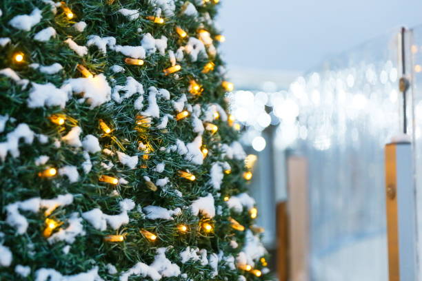istock Christmas tree in a luminous garland. 1345270634