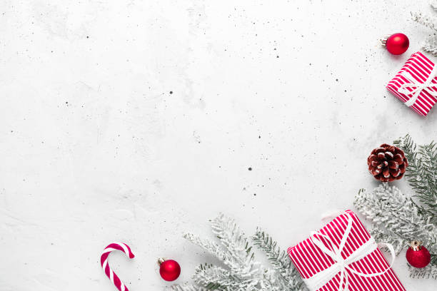 istock Christmas and New Year flat lay with two red white present gift boxes top view 1345272109