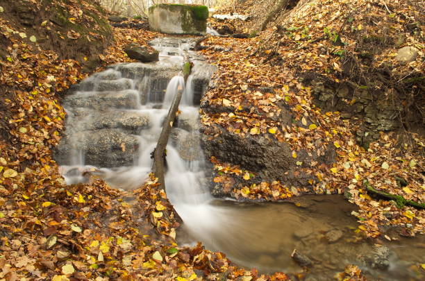 istock Saule waterfall in autumn day, Matkule, Latvia 1345273113
