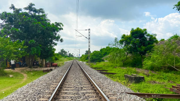 istock Indian railways train on the track with engine close up goods carrier 1345274565