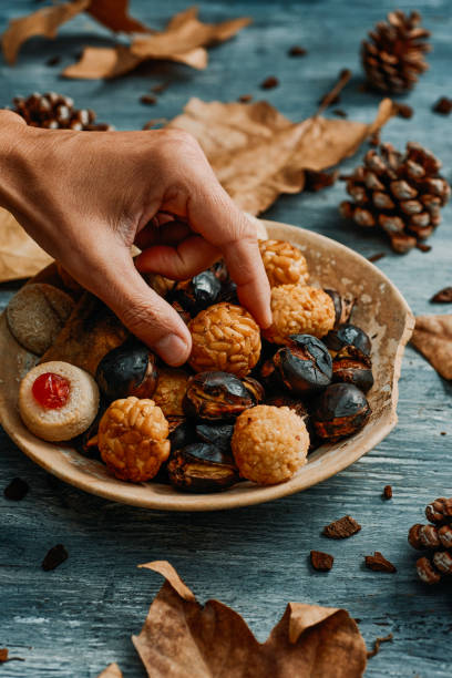 takes a panellet, typical confection of Catalonia