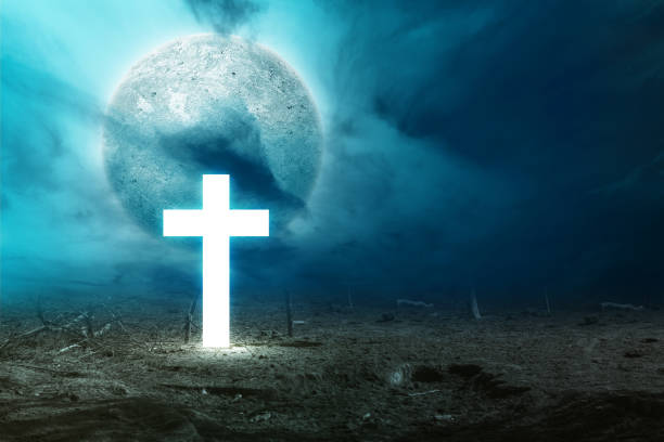 istock Full moon with dark cloudscapes and shiny cross on the night 1345276703