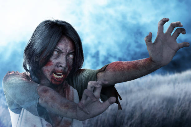 istock Scary zombie with blood and wound on his body 1345277971