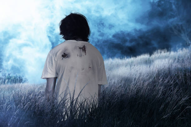 istock Scary zombie with blood and wound on his body 1345278167