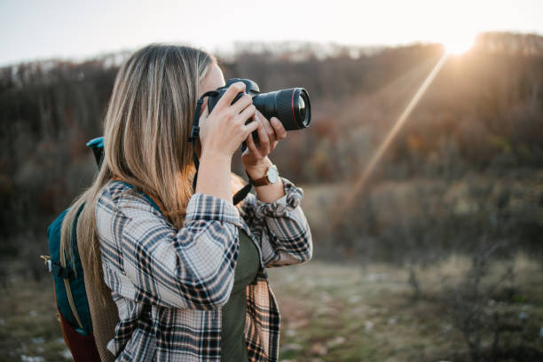 istock Photographer taking photo 1345278270