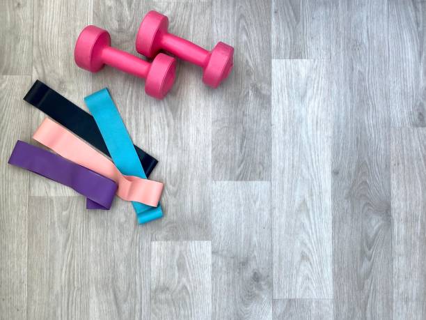 istock Home training concept, dumbbells and elastic bands for yoga 1345281652