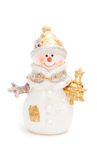 istock Snowman holding a Christmas tree on a white background. 1345283186