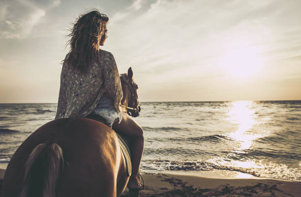 istock Horseback riding on the beach! 1345283276