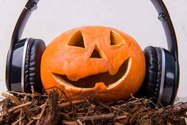 istock Jack-o-Lantern with headphones 1345286067