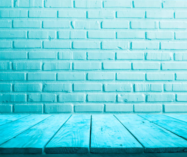Selective focus/Colorful of wood table top with pstel brick background. Selective focus/Colorful of wood table top with pstel brick background.For create product display or design key visual layout white shabby chic desk stock pictures, royalty-free photos & images