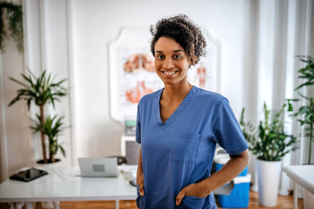 istock Portrait of nurse while standing in doctor's office 1345291254