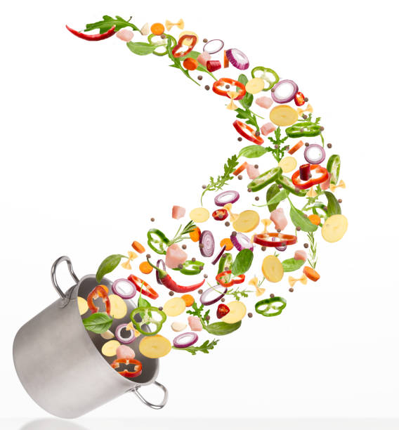 istock Fresh vegetables flying into steel pot, isolated on white background 1345291341