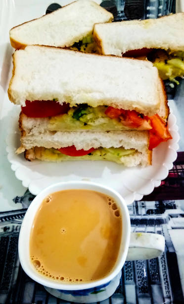 istock A bread sandwiches and a cup of tea on table 1345291808