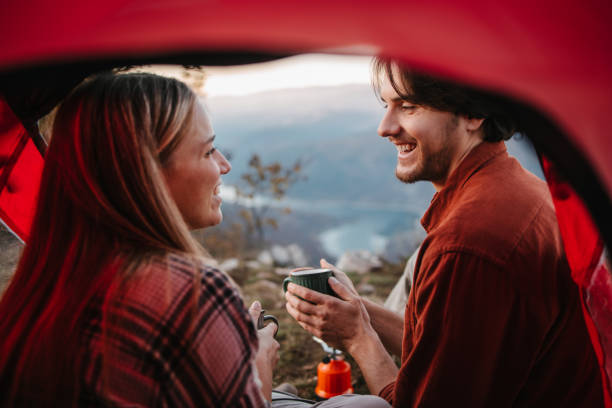 istock Rear view of a campers holding tea cup 1345293505