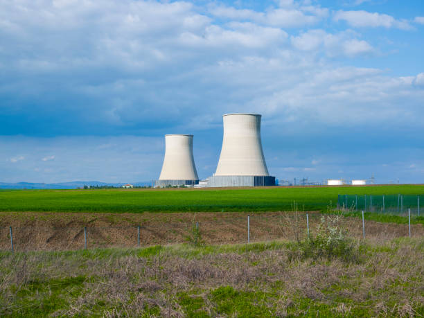 istock Thermal power plant chimneys 1345294214