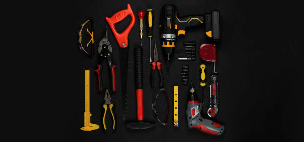 istock Cordless cordless drill - screwdriver with drill. Construction tools set. Black background. Goods for repair. Professional repair equipment. 1345294777
