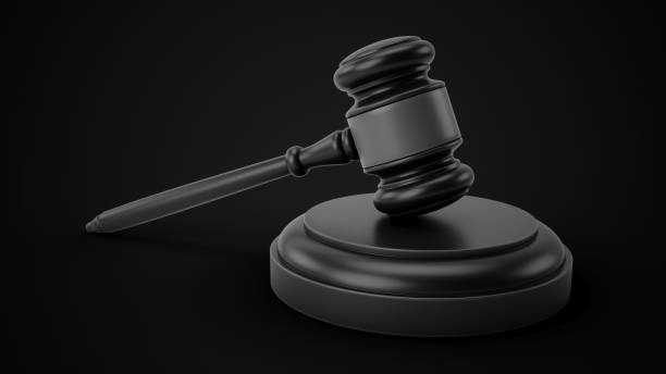 istock 3D rendering dark gavel, Judge Hammer on black background 1345295768