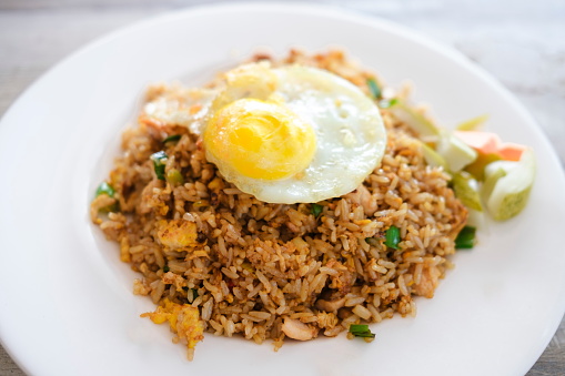 A special fried rice is fried rice with Sunny Side Up egg on top.