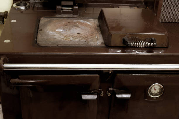 Old style oil burning stove in retro kitchen interior
