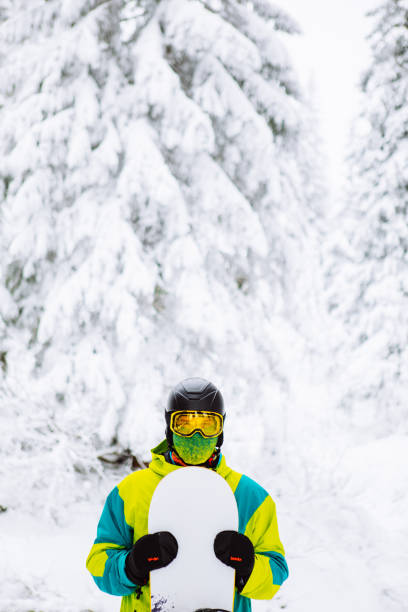 man snowboarder in ski equipment copy space