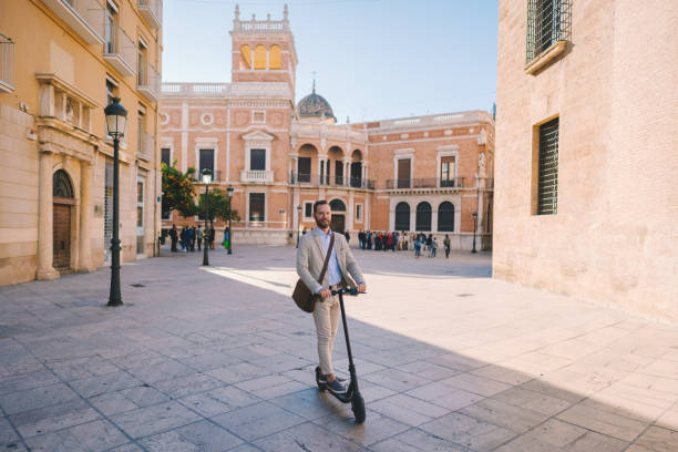 istock Businessman riding a motor e-scooter in Valencia 1345304658