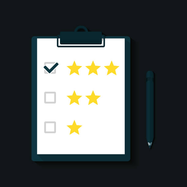 istock Clipboard paper with stars and pen pencil. Customer feedback, quality control, reviews and rating. 1345306253