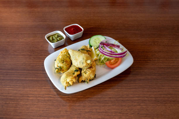 istock Fried Chicken Wings with dips on brown wooden table 1345307430