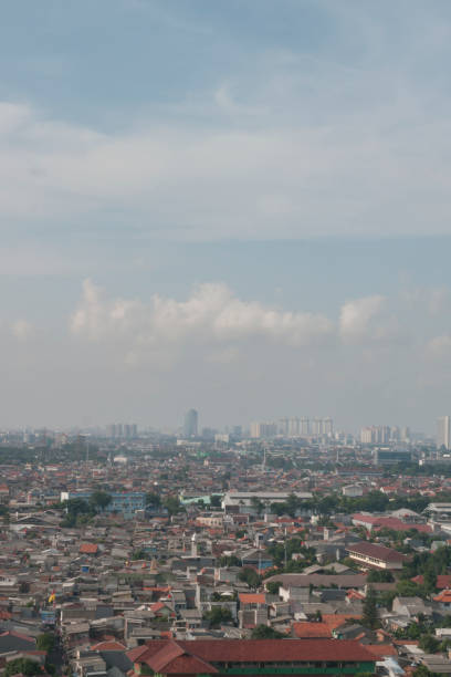istock Jakarta City crowded houses with polluted sky 1345308082