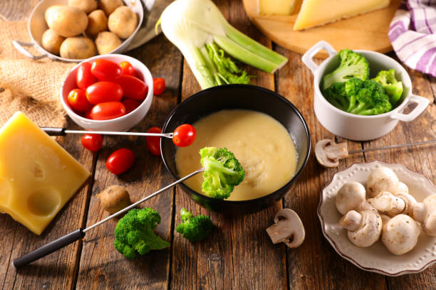 istock cheese fondue with vegetable on table 1345309457