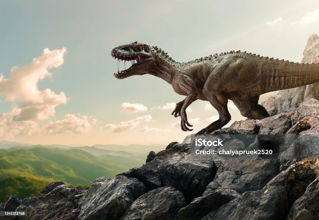 Dinosaurio Tyrannosaurus Rex en la cima de la roca de la montaña - Foto de stock de Dinosaurio libre de derechos
