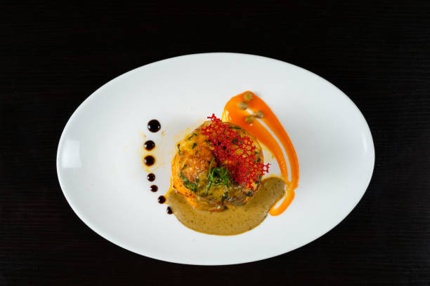 istock Chicken breast stuffed with cheese and served with different sauces on white plate 1345316391